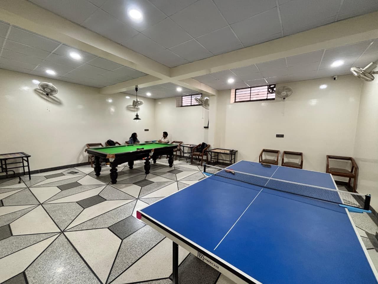Games room with billiards and table tennis