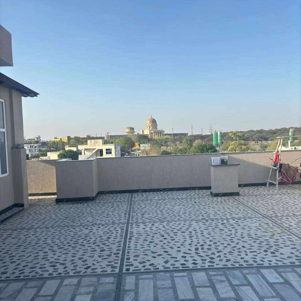 Rooftop with city and university view