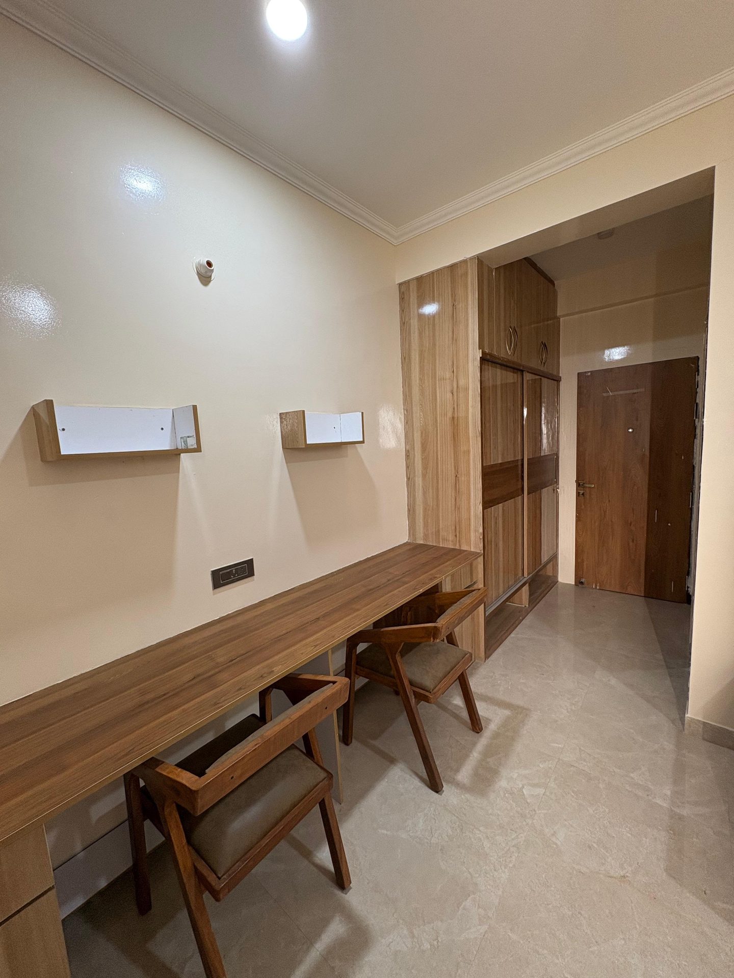 A private study desk with wardrobe storage